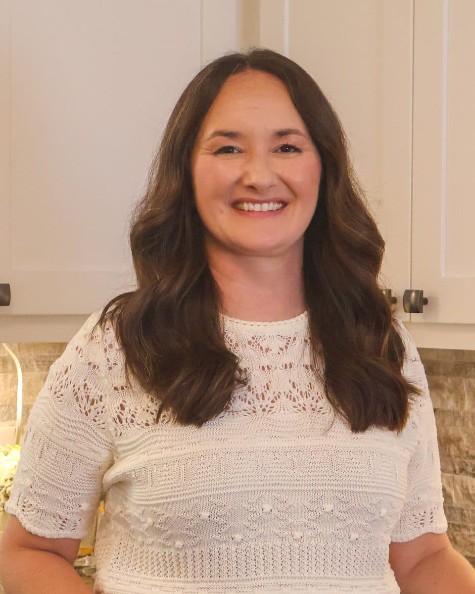 Amanda smiling in the family kitchen
